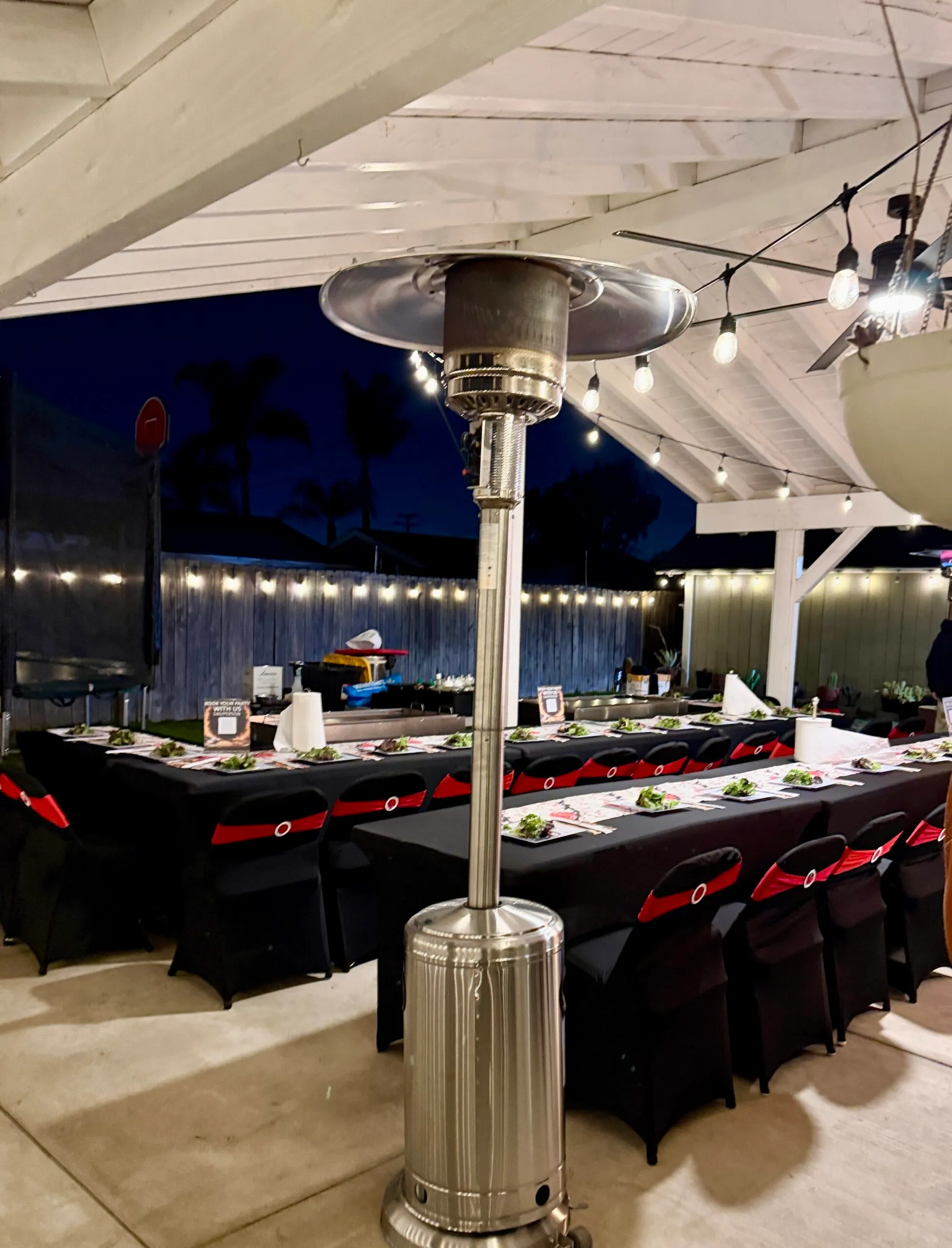 Teppan chef performing a live teppanyaki cooking show for guests